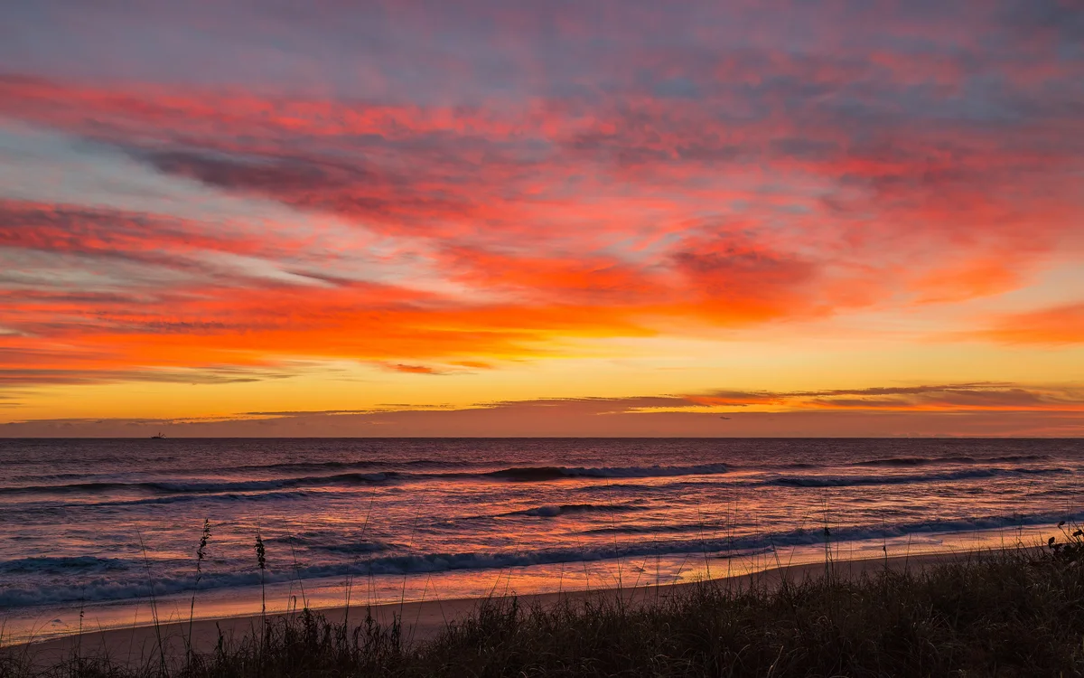 Sunrise over the surf at Satellite Beach in Brevard County, Florida