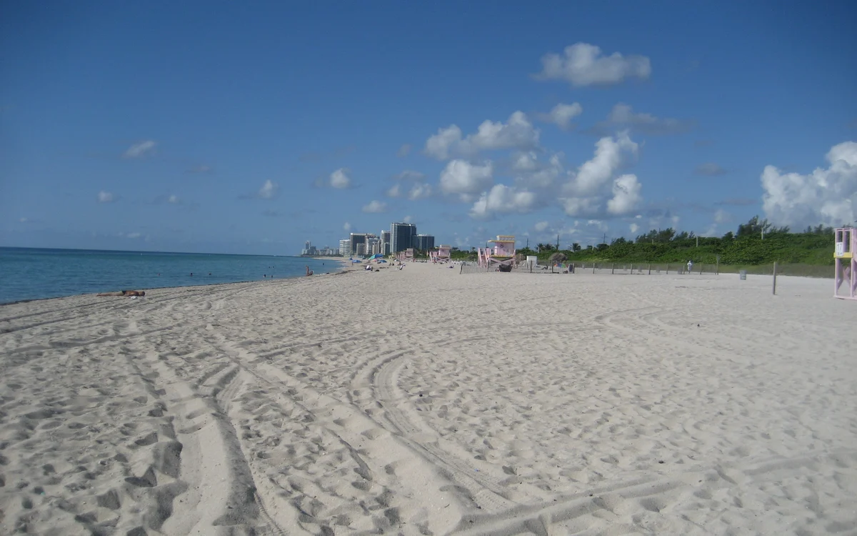 The wide raked sand at Haulover Beach looking south towards the Miami Beach skyline, Miami-Dade County, Florida
