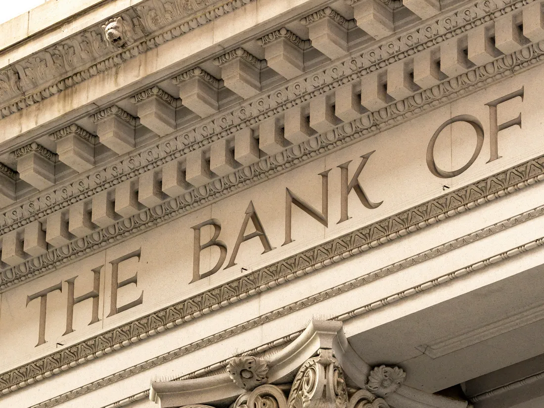 A carved stone bank front with columns