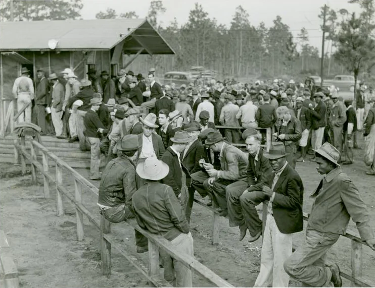 Workers wait outside the state employment office in Starke for jobs at Camp Blanding, December 1940.
