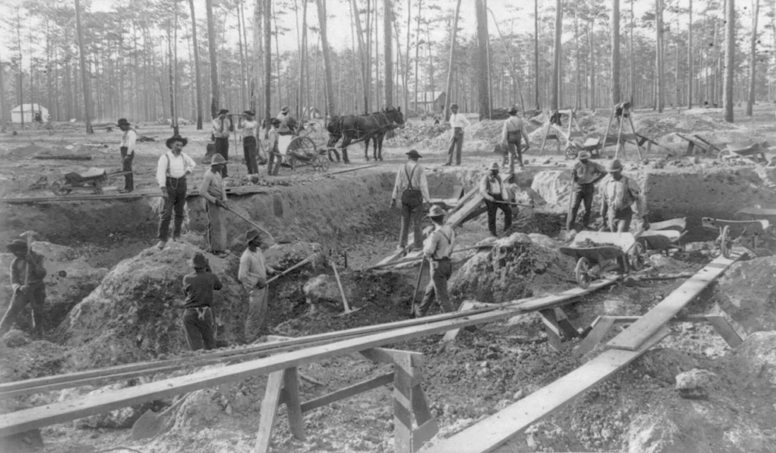 Men at work in a shallow phosphate pit mine at Dunnellon, Florida, 1890.