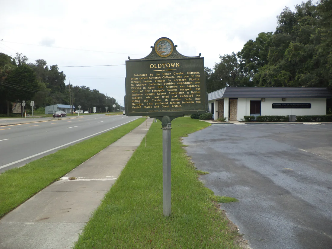 The state marker for Oldtown beside the highway in Old Town, 2014.