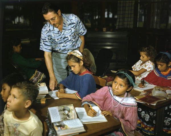William Boehmer teaching Seminole children at the Brighton day school, about 1948.