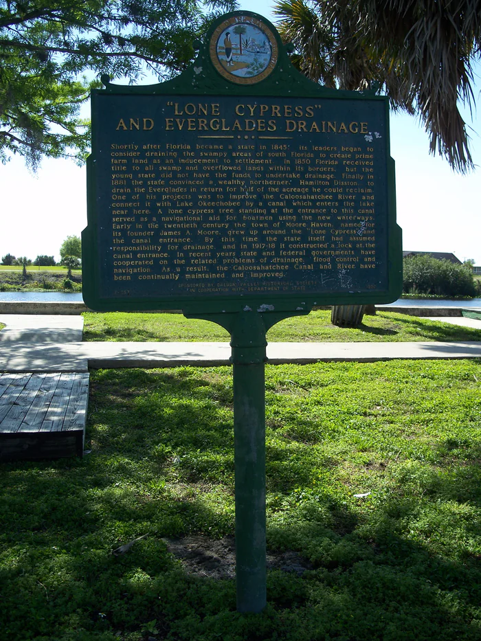 The state marker for the Lone Cypress and Everglades drainage in Moore Haven.