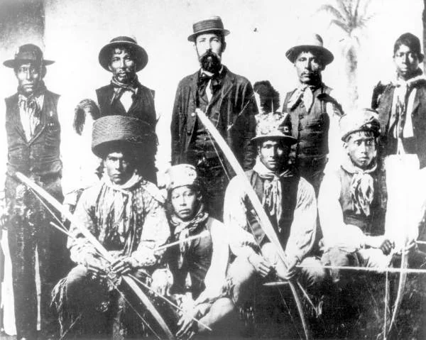 Captain Francis Asbury Hendry, standing in the center, with a group of Seminole Indians, about 1870.