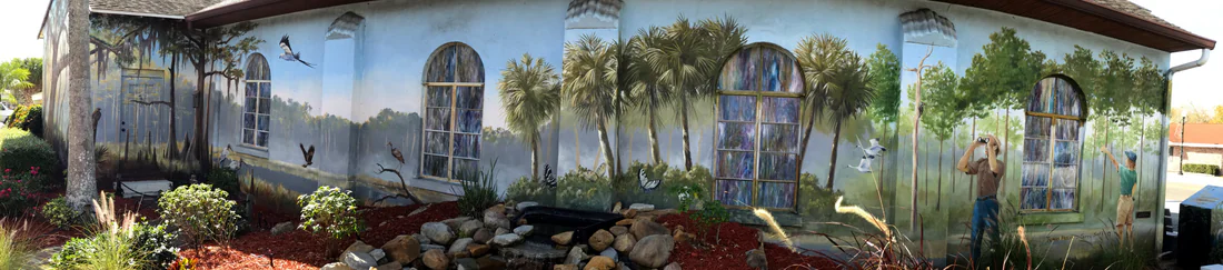 A painted building wall in Lake Placid, the Town of Murals, 2021.