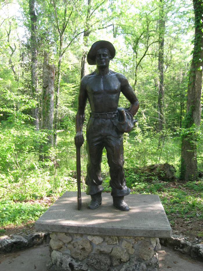 A statue honoring the Civilian Conservation Corps workers who helped build Florida Caverns State Park.