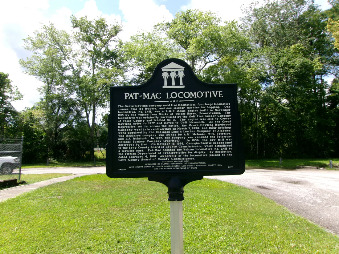The Pat-Mac Locomotive side of the state marker at the Gulf Hammock Wayside Park.