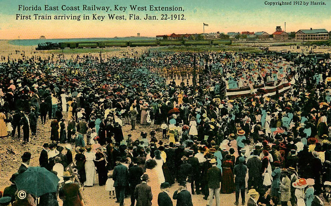 Crowds at the arrival of the first train in Key West, January 22, 1912, on a tinted postcard.