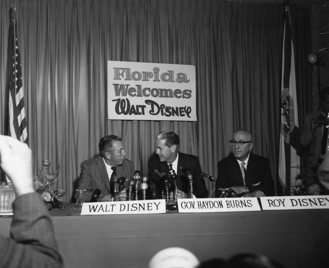 Walt Disney, his brother Roy and Governor Haydon Burns at the 1965 press conference in Orlando that announced the Florida project.