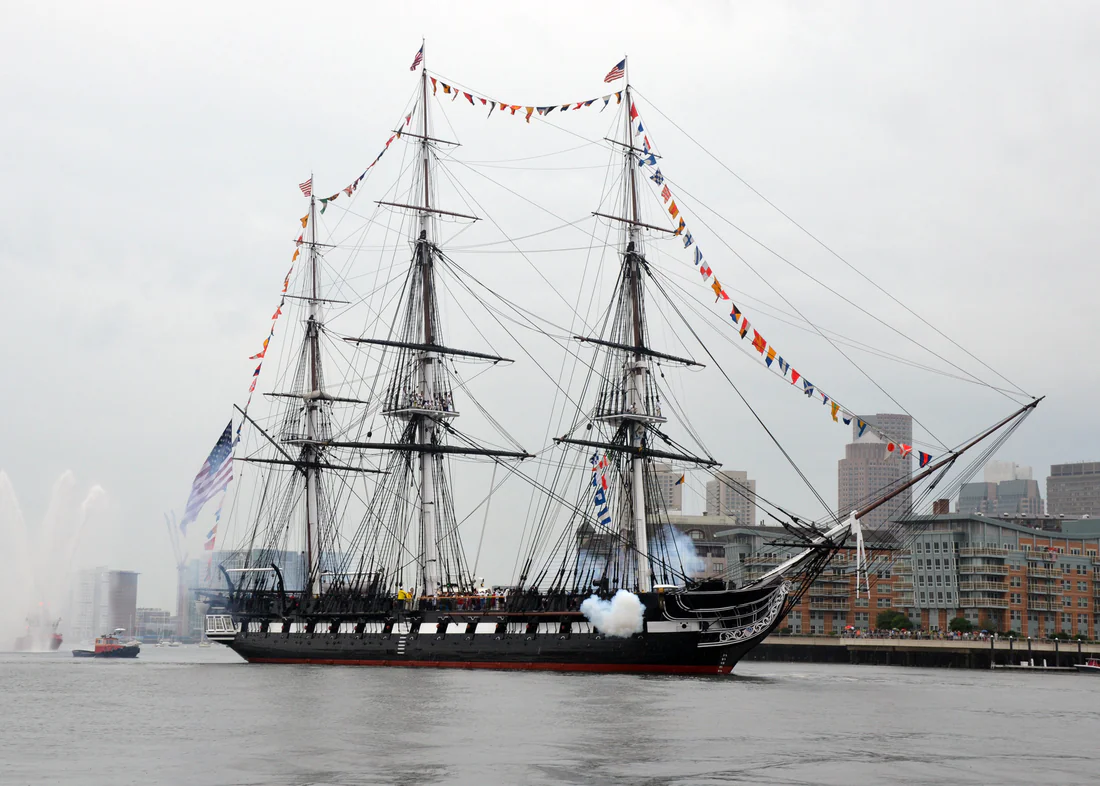 The USS Constitution, launched in 1797, firing a salute in 2014.