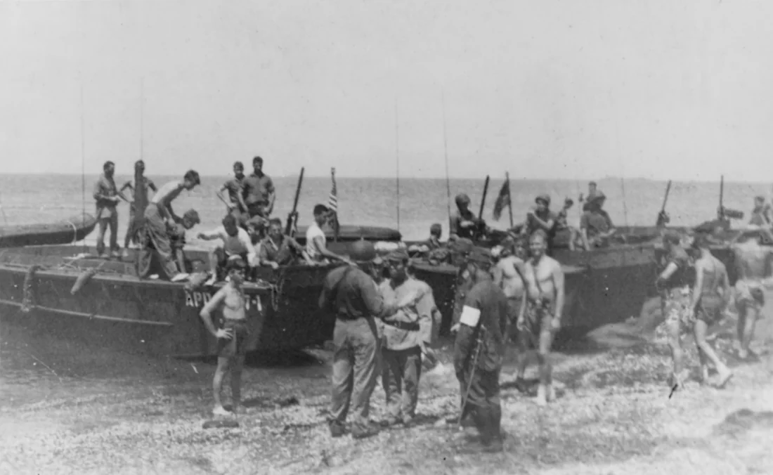 Navy Underwater Demolition Team 21 coming ashore in Tokyo Bay, August 28, 1945.