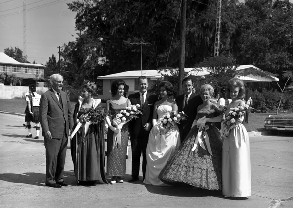 The queen and court of the eighth Pine Tree Festival with dignitaries in Perry, 1963.
