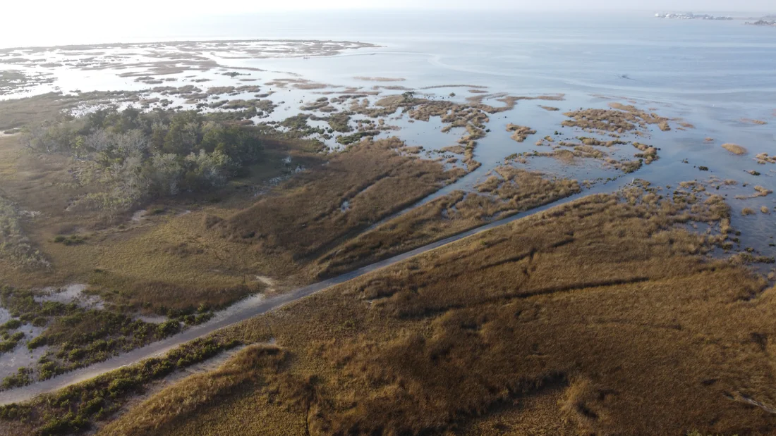 Salt marsh and open water at Hagens Cove from the air, 2022.